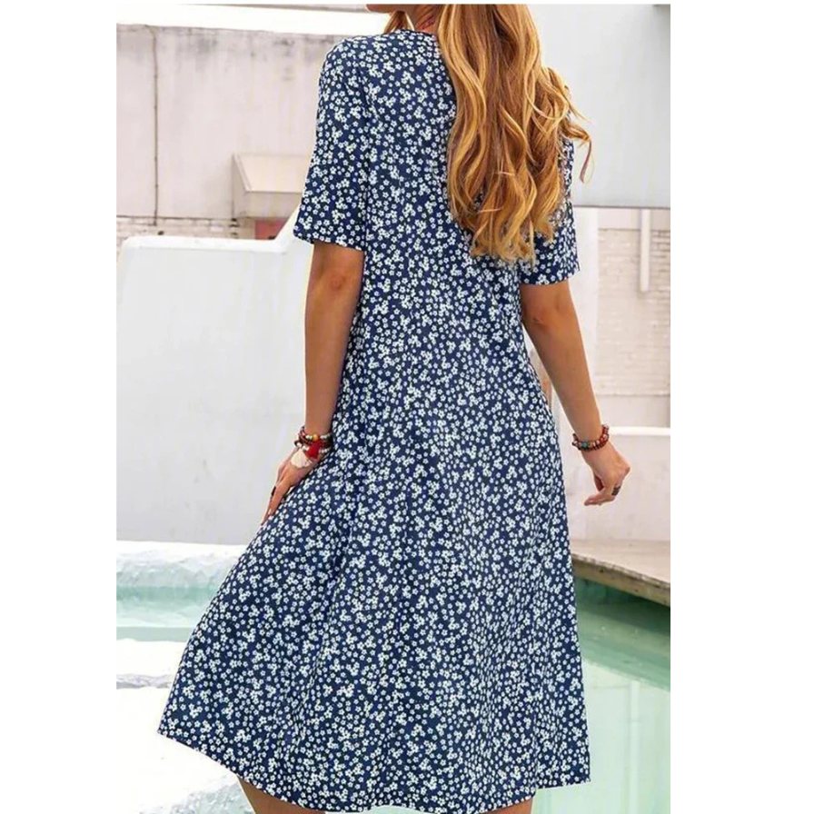 Boho Summer Dress with a flowy silhouette, perfect for warm summer days and bohemian style.