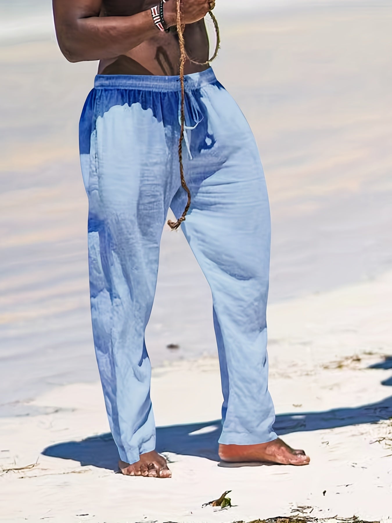 Casual linen pants for men, ideal for summer days with breathable fabric and a relaxed fit for comfort.






