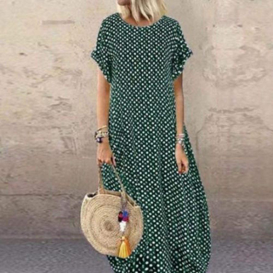 Chic breathable maxi dress for summer with a flowing design, lightweight fabric, and versatile style, ideal for warm days.