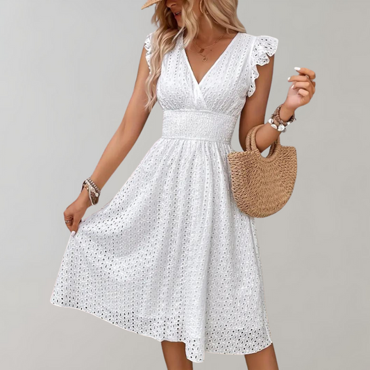 Chic flowy summer dress with an airy silhouette and lightweight fabric, ideal for casual outings and warm summer days.






