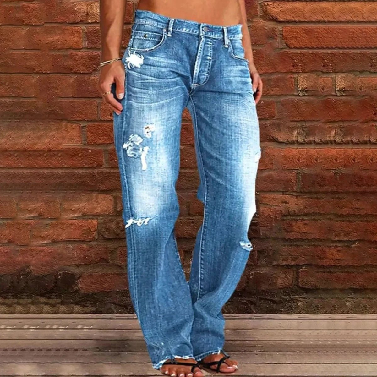 Classic denim jeans for women with a flattering fit and durable design, ideal for casual wear and summer days.