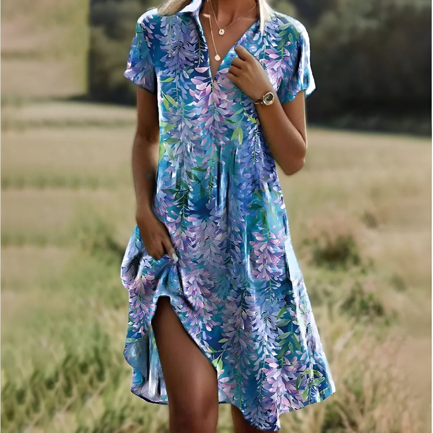  A lightweight colorful midi summer dress for women, perfect for warm days, offering a flattering fit and versatile style.






