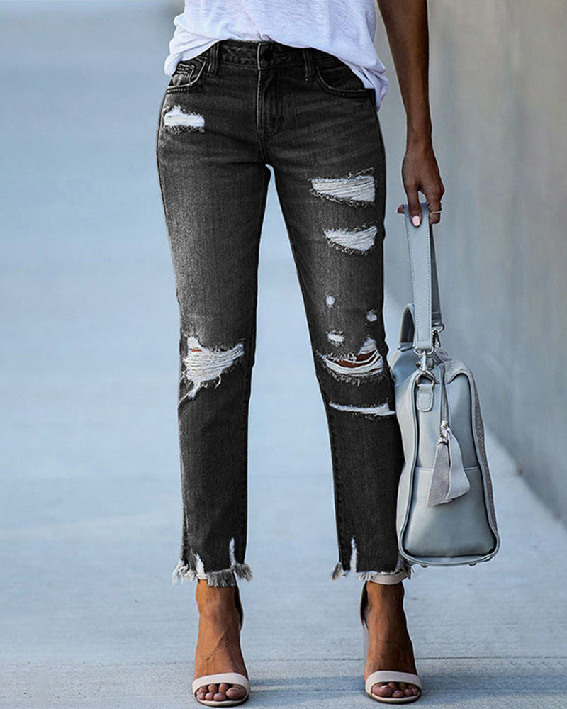 Trendy ripped jeans for women offering a casual and comfortable fit, ideal for summer days.






