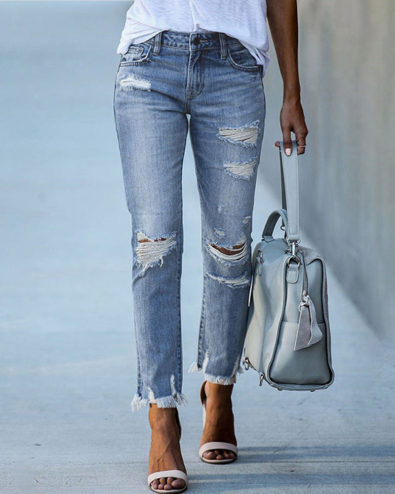 Trendy ripped jeans for women offering a casual and comfortable fit, ideal for summer days.






