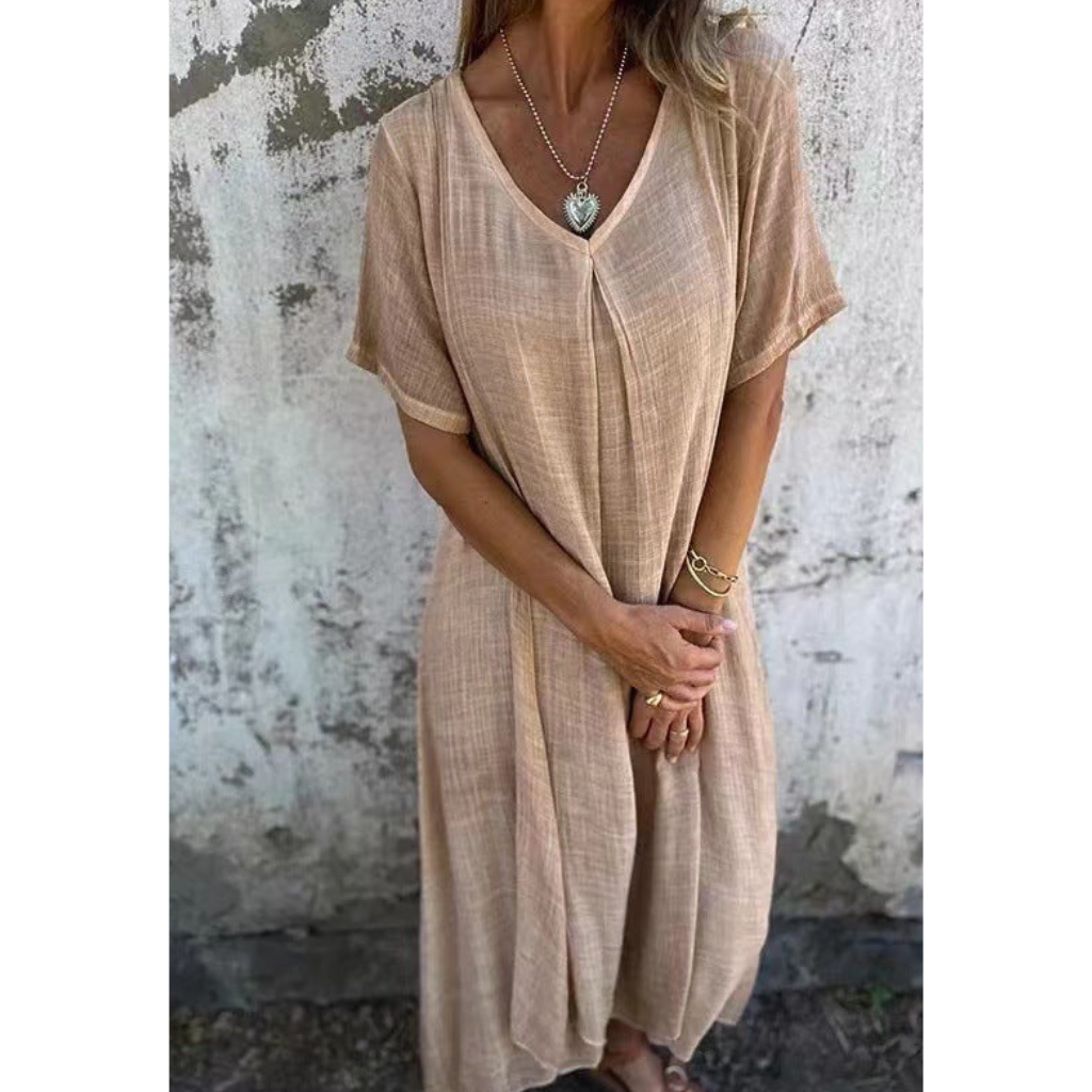 Elegant comfy summer dress, perfect for warm weather and ideal for casual or dressy occasions.