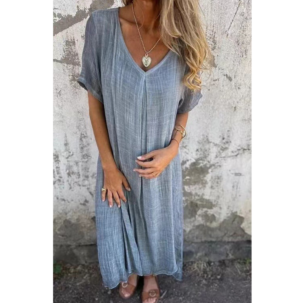 Elegant comfy summer dress, perfect for warm weather and ideal for casual or dressy occasions.