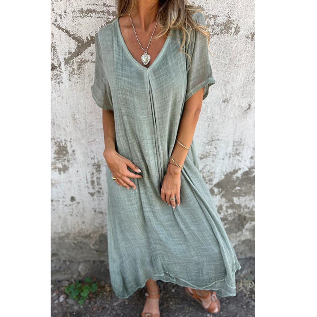 Elegant comfy summer dress, perfect for warm weather and ideal for casual or dressy occasions.