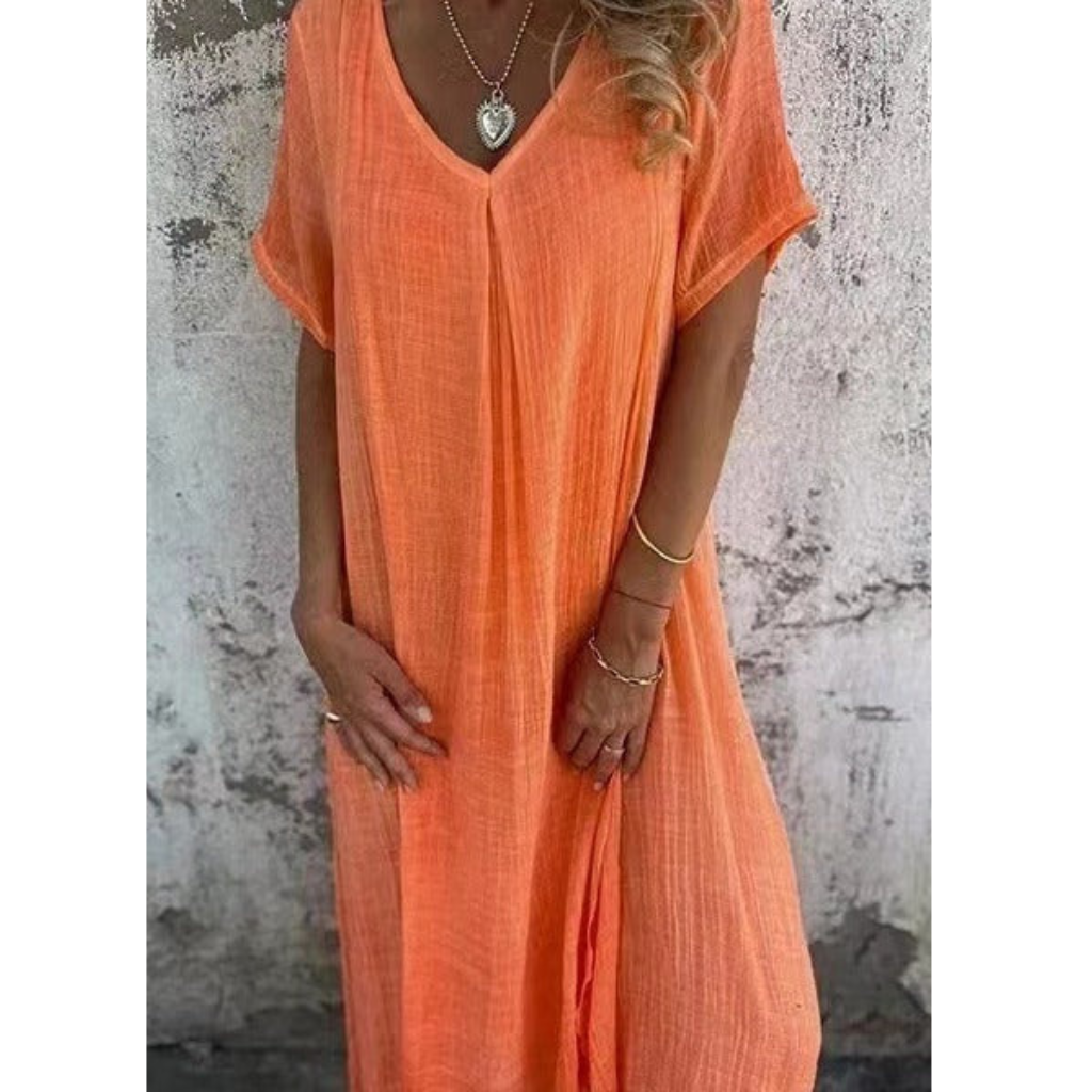 Elegant comfy summer dress, perfect for warm weather and ideal for casual or dressy occasions.