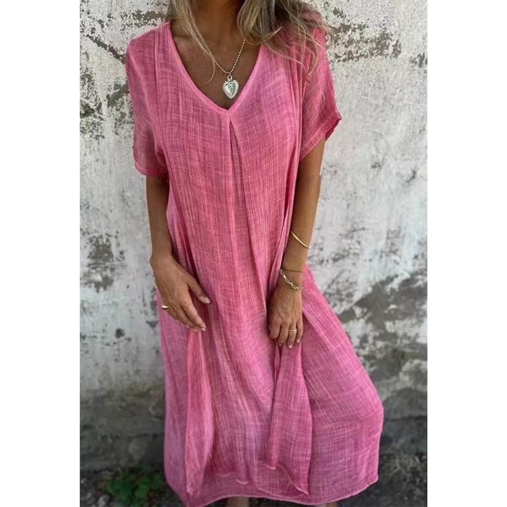 Elegant comfy summer dress, perfect for warm weather and ideal for casual or dressy occasions.