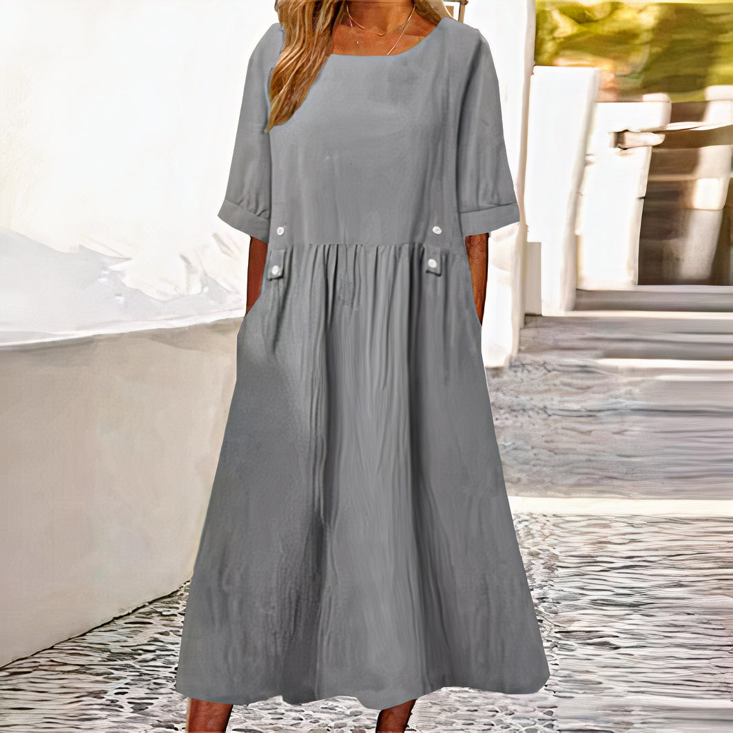 Elegant cotton-linen dress for women, ideal for summer days, featuring breathable fabric and a versatile, flattering design for comfort and style.






