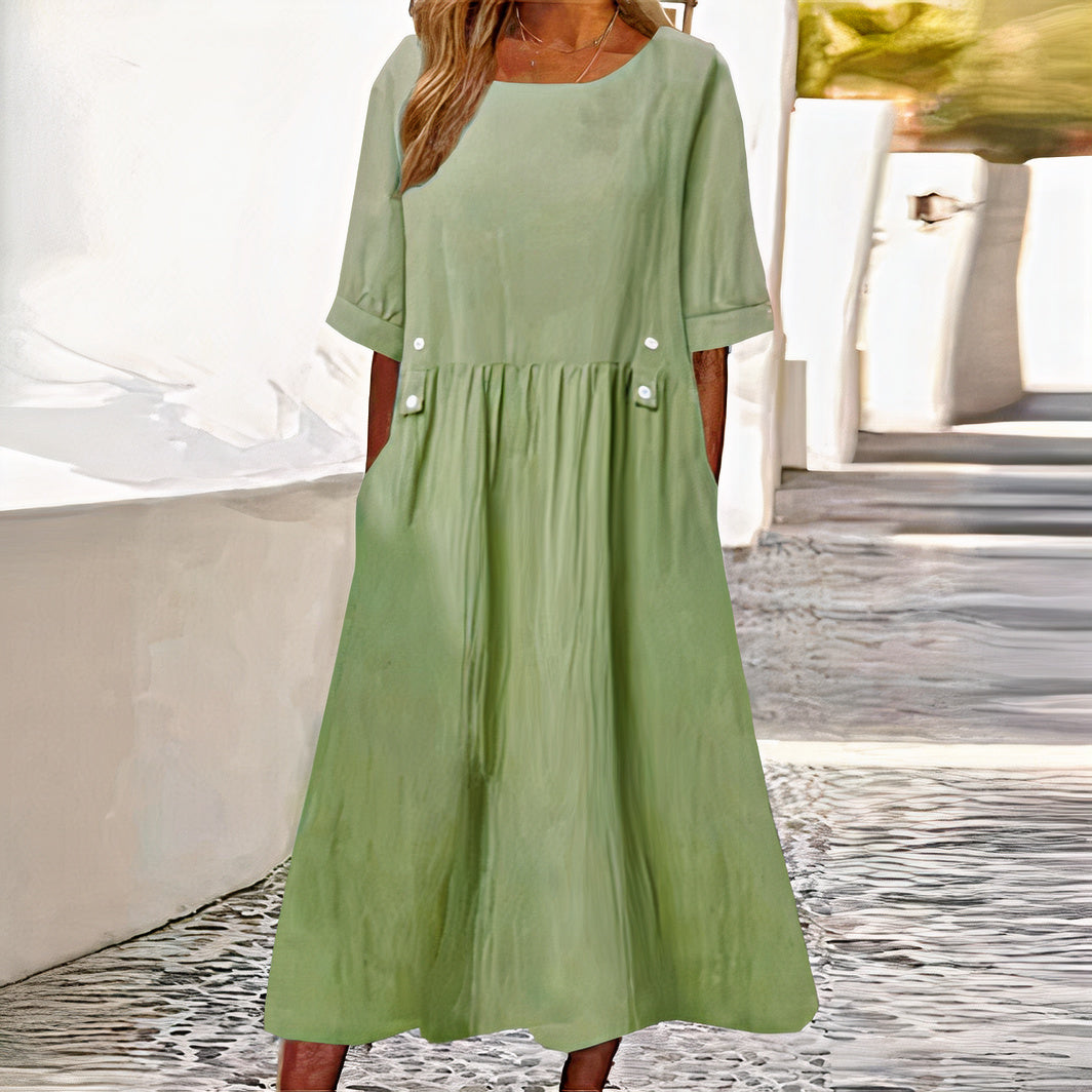 Elegant cotton-linen dress for women, ideal for summer days, featuring breathable fabric and a versatile, flattering design for comfort and style.






