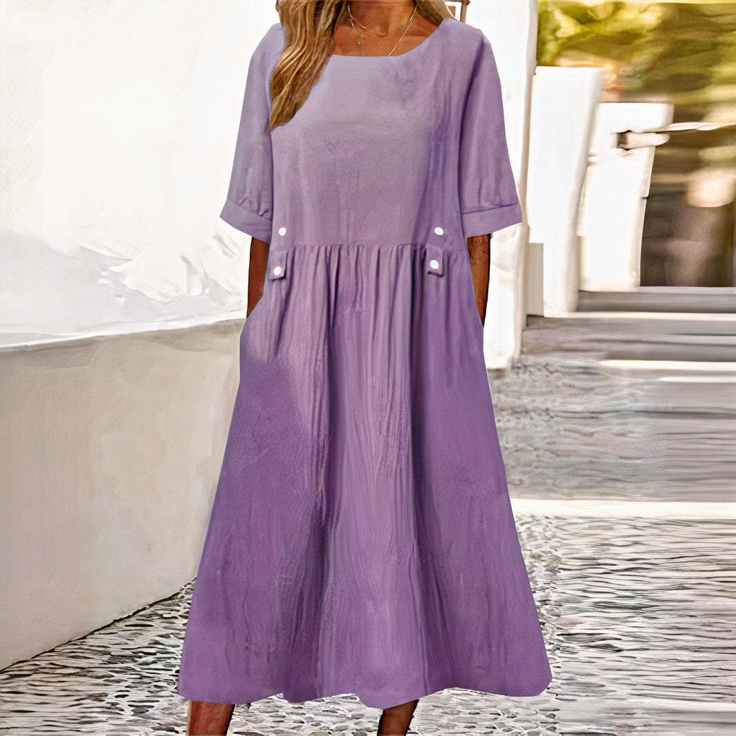 Elegant cotton-linen dress for women, ideal for summer days, featuring breathable fabric and a versatile, flattering design for comfort and style.






