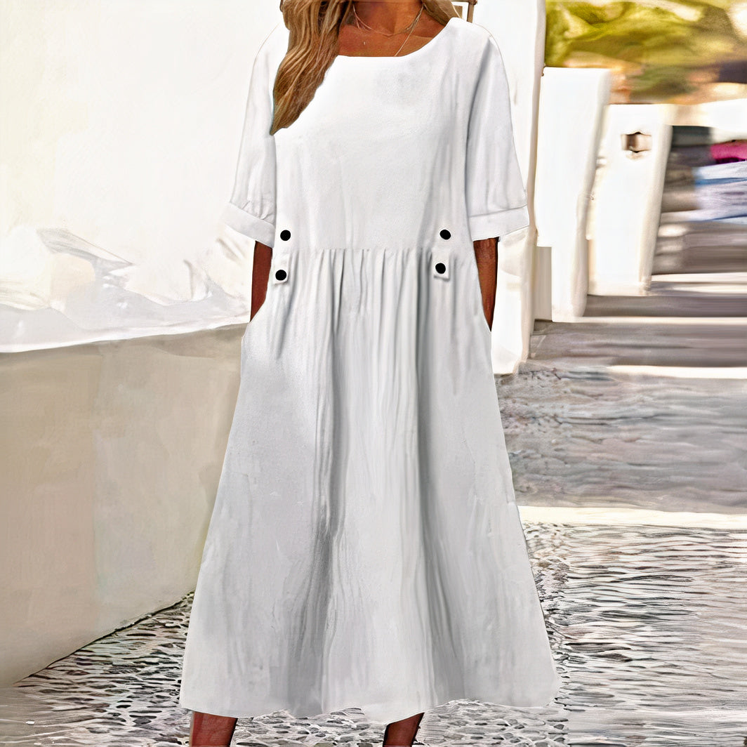 Elegant cotton-linen dress for women, ideal for summer days, featuring breathable fabric and a versatile, flattering design for comfort and style.






