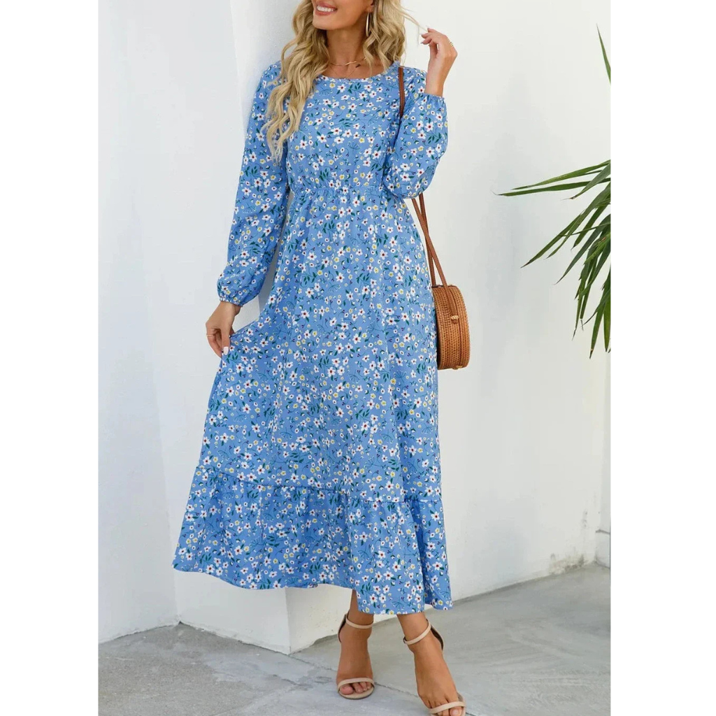 Elegant floral dress with a flattering waistline, perfect for summer events and casual outings.






