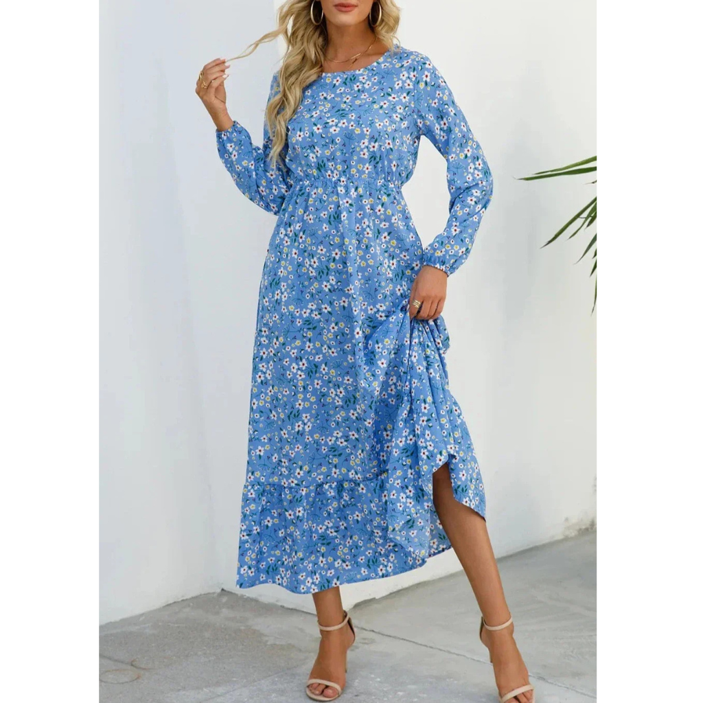 Elegant floral dress with a flattering waistline, perfect for summer events and casual outings.






