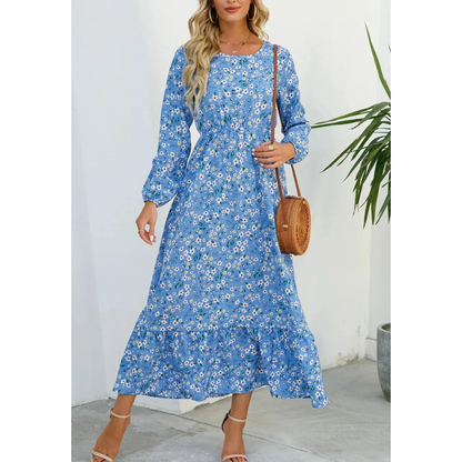 Elegant floral dress with a flattering waistline, perfect for summer events and casual outings.






