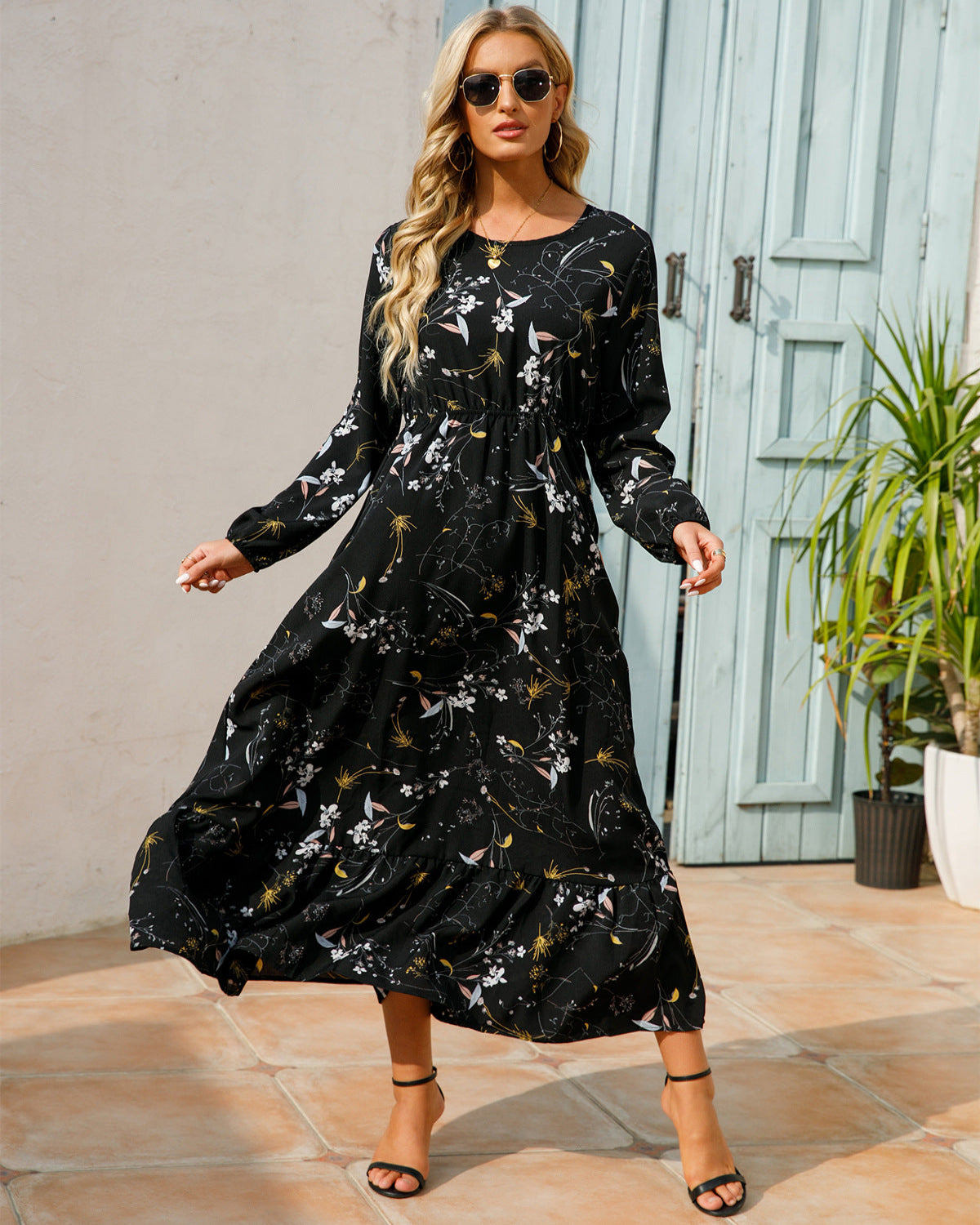 Elegant floral maxi dress with a flattering silhouette and delicate floral pattern, perfect for warm summer days and versatile styling.






