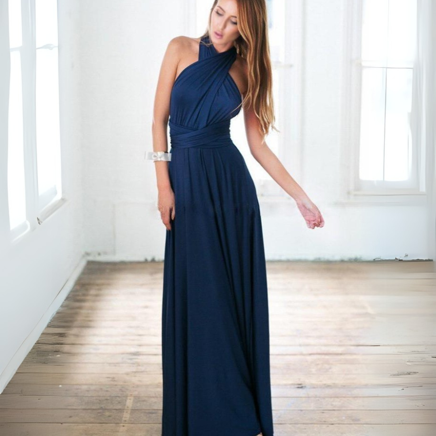 An elegant long bridesmaid dress with a flowing silhouette, perfect for weddings and summer celebrations.






