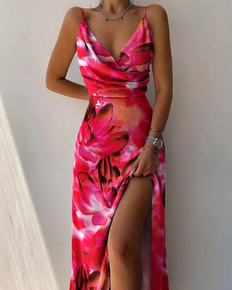 Elegant maxi cocktail dress with a slit, perfect for summer evenings and special occasions, featuring a flowing silhouette.