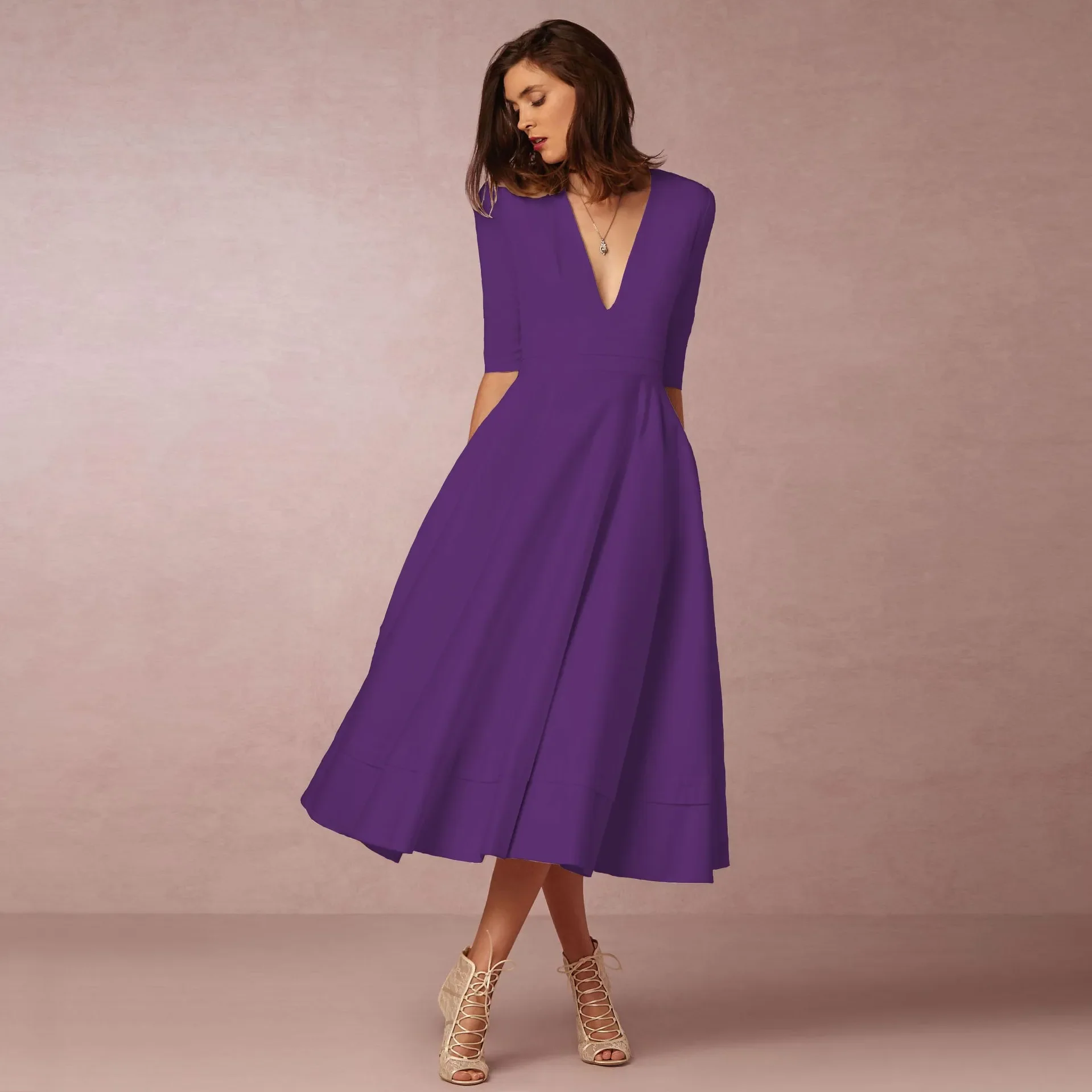 Elegant midi party dress for women with a flattering silhouette and lightweight material, ideal for summer occasions.






