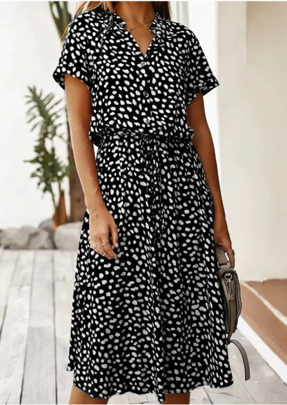 Elegant Midi Spring Dress, lightweight and versatile, perfect for warm days and spring occasions.