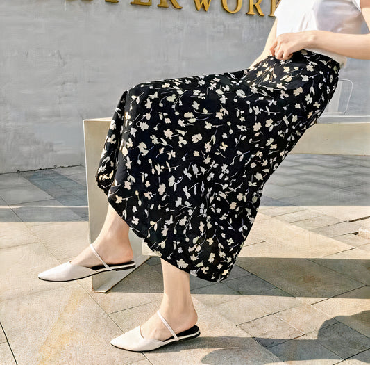 Fashionable summer midi skirt with a flowy silhouette, perfect for warm-weather comfort and effortless style.