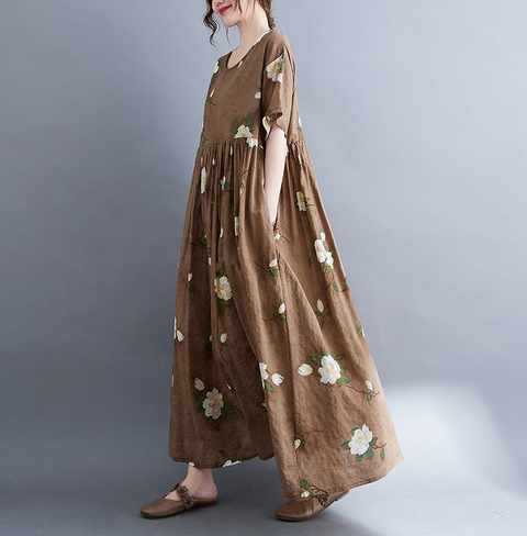 Floral summer long dress with a flowing silhouette, perfect for staying cool and stylish on warm summer days.