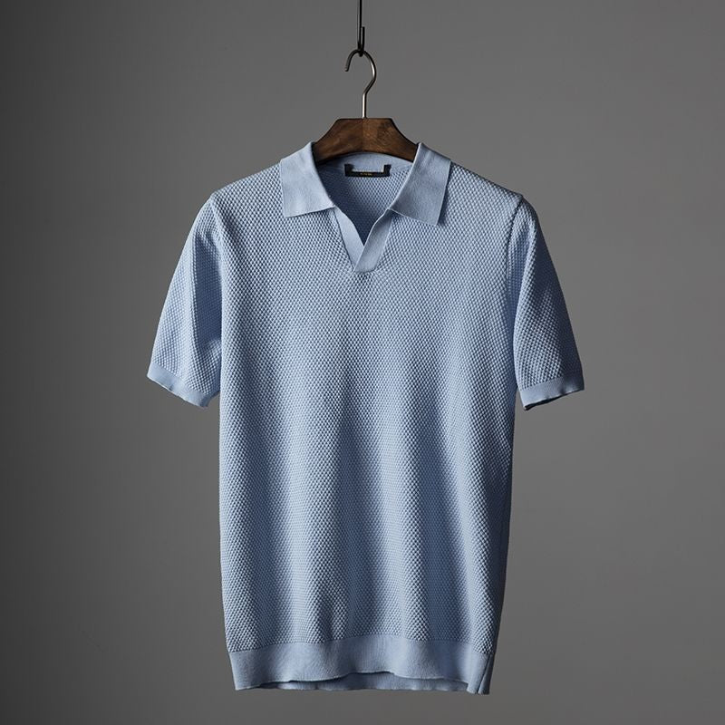 Men's elegant knitted polo shirt with a breathable design, ideal for summer days and versatile occasions.