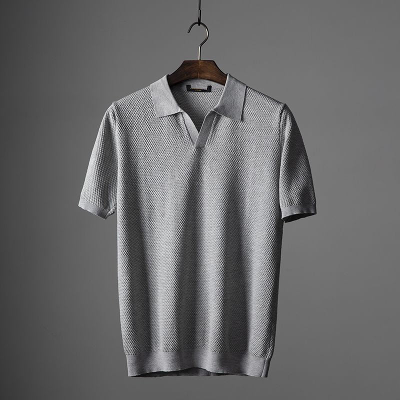 Men's elegant knitted polo shirt with a breathable design, ideal for summer days and versatile occasions.