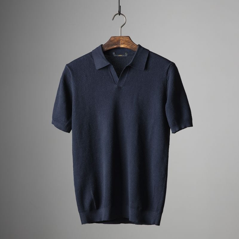 Men's elegant knitted polo shirt with a breathable design, ideal for summer days and versatile occasions.