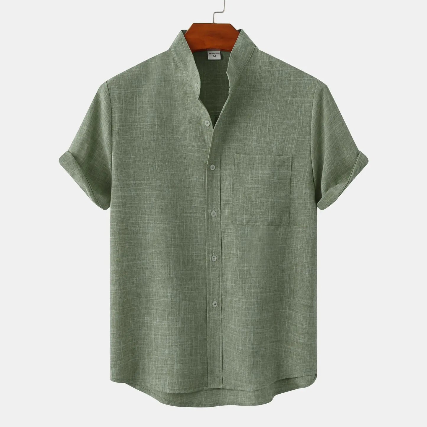  Men's linen shirt for summer, featuring lightweight and breathable fabric, perfect for warm days, with a timeless design suitable for various occasions.