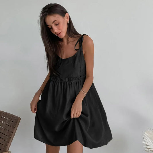 Soft women's summer mini dress, perfect for warm days, featuring a lightweight, breathable fabric and flattering fit ideal for casual outings or summer parties.






