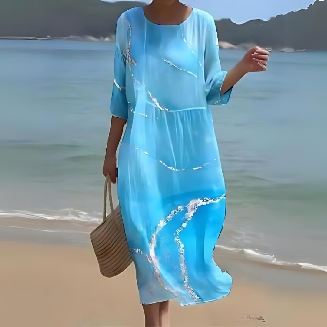  Sophisticated beach dress ideal for summer days, offering elegance and comfort