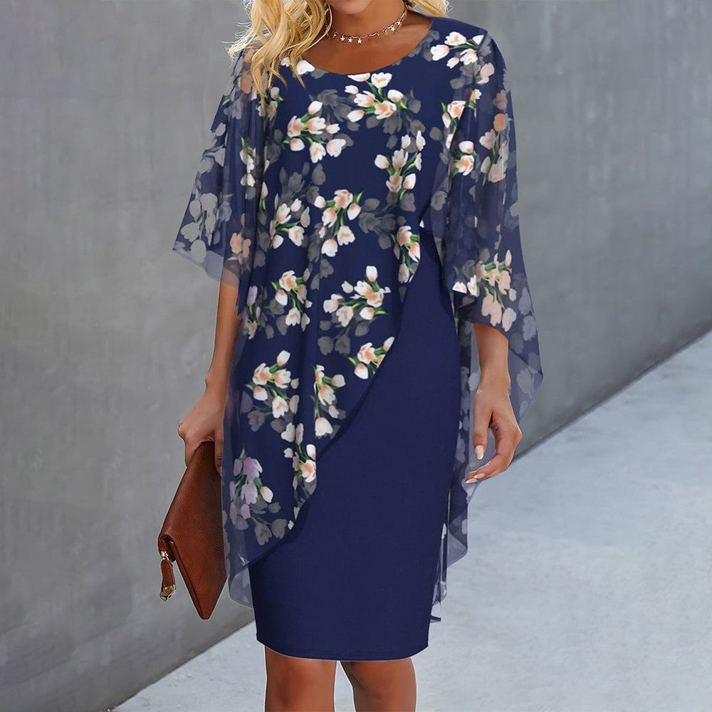 A sophisticated floral summer dress, ideal for warm-weather occasions, featuring breathable fabric and a flattering silhouette.






