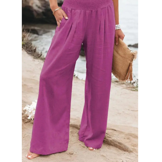  Stylish women's cotton pants with a relaxed fit, elastic waistband, and breathable fabric, ideal for summer days.