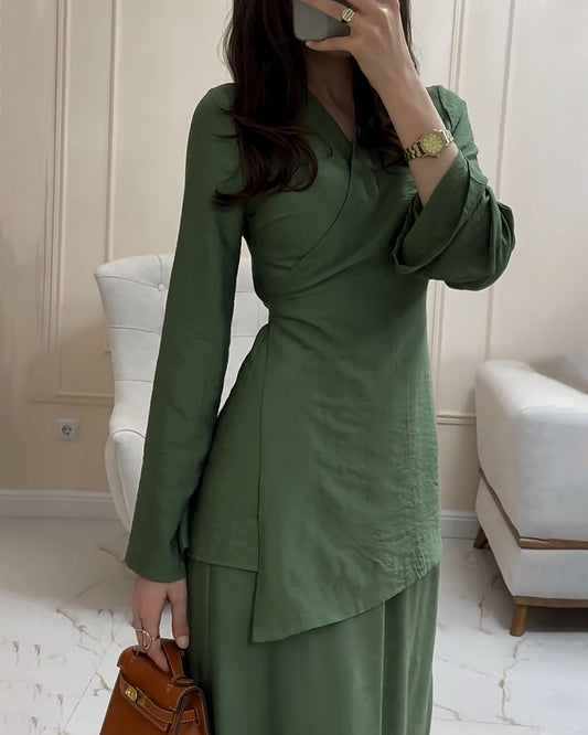 Stylish women's linen dress with long sleeves, perfect for staying cool and elegant on