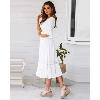 Stylish women's summer dress with a lightweight, flattering fit, perfect for warm weather and casual gatherings.






