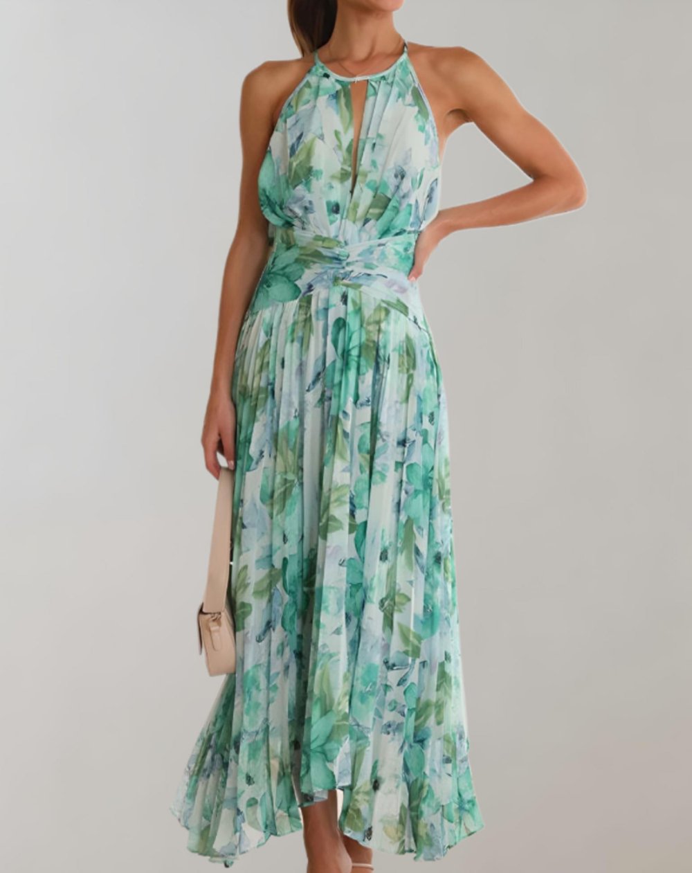 A stylish floral summer dress designed for comfort and elegance, featuring a flattering fit and lightweight fabric, ideal for warm weather occasions