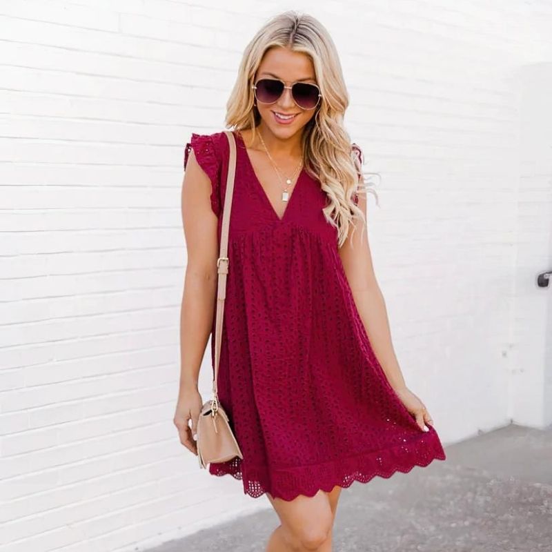 A trendy and elegant beach dress, perfect for summer days by the beach or casual seaside events.






