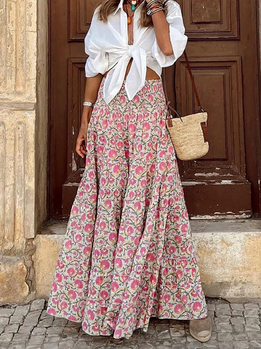  Women's boho chic maxi summer skirt with a flowing design, perfect for warm days and effortless style.






