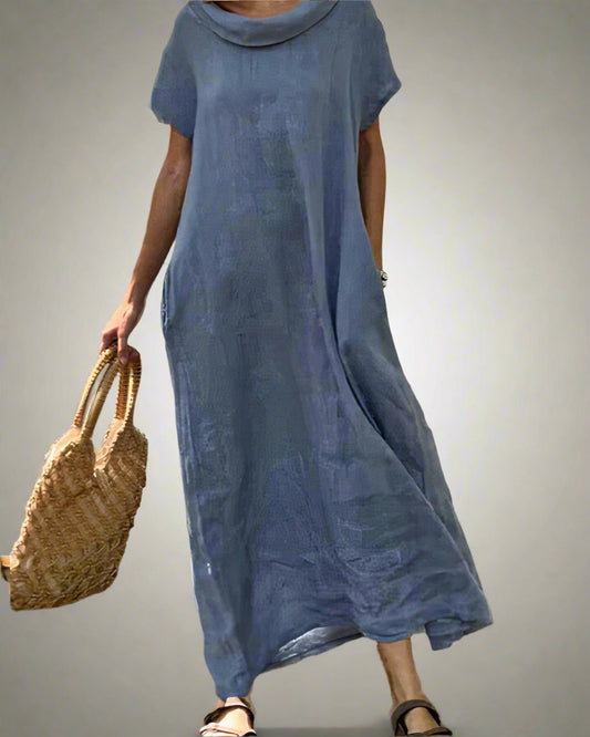 Women's casual long dress with a flowy silhouette and breathable fabric, perfect for summer days and relaxed elegance.






