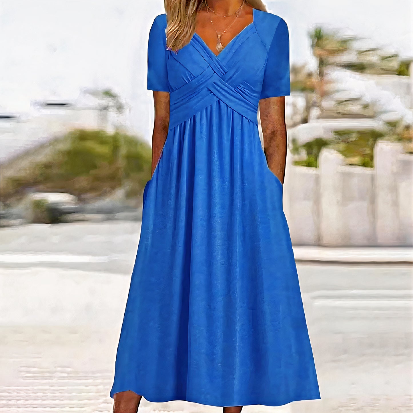 Women's chic summer dress with belly coverage, offering a flattering fit and lightweight design, ideal for warm summer days.