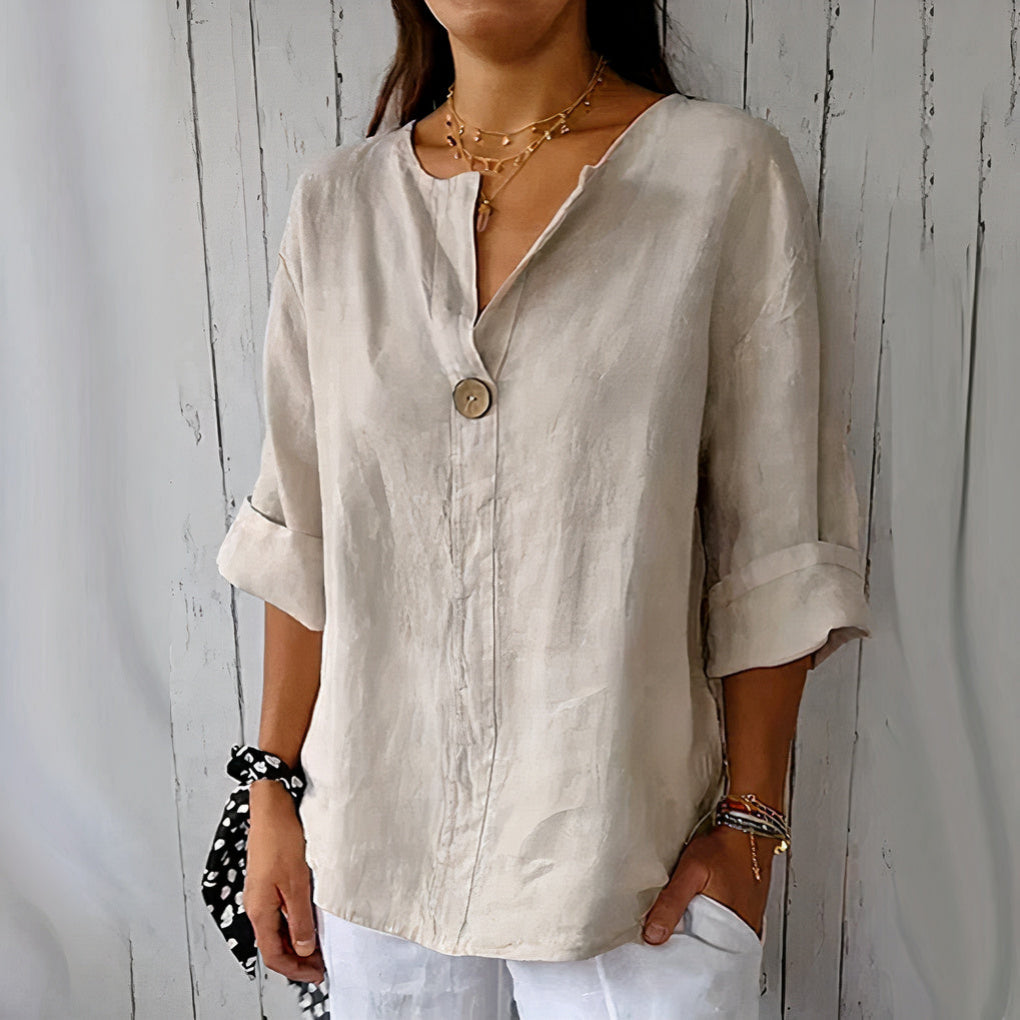 Women's lightweight linen blouse with a relaxed fit, perfect for casual summer days or beach outings.