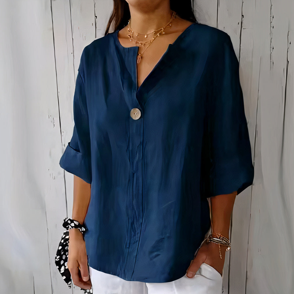 Women's lightweight linen blouse with a relaxed fit, perfect for casual summer days or beach outings.