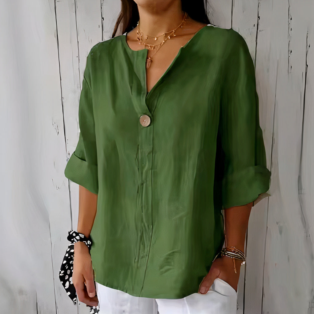 Women's lightweight linen blouse with a relaxed fit, perfect for casual summer days or beach outings.