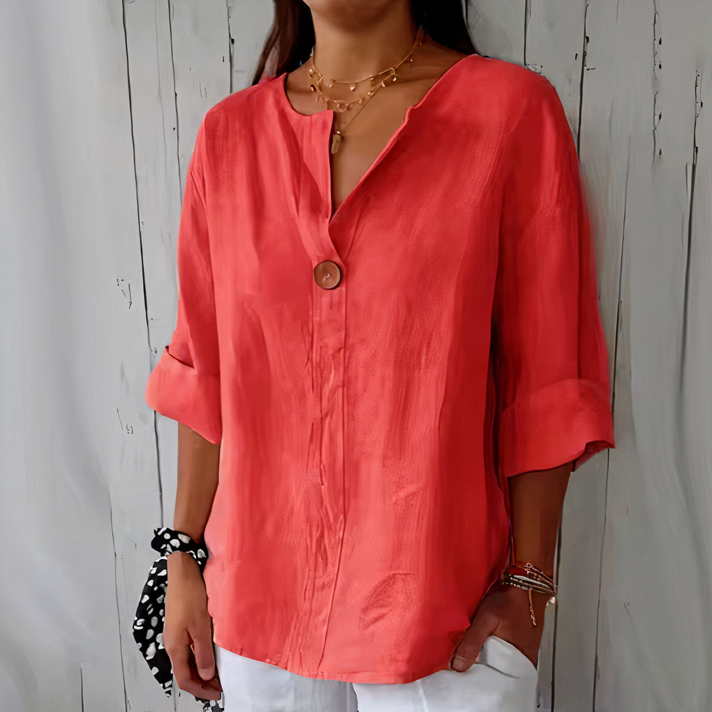 Women's lightweight linen blouse with a relaxed fit, perfect for casual summer days or beach outings.