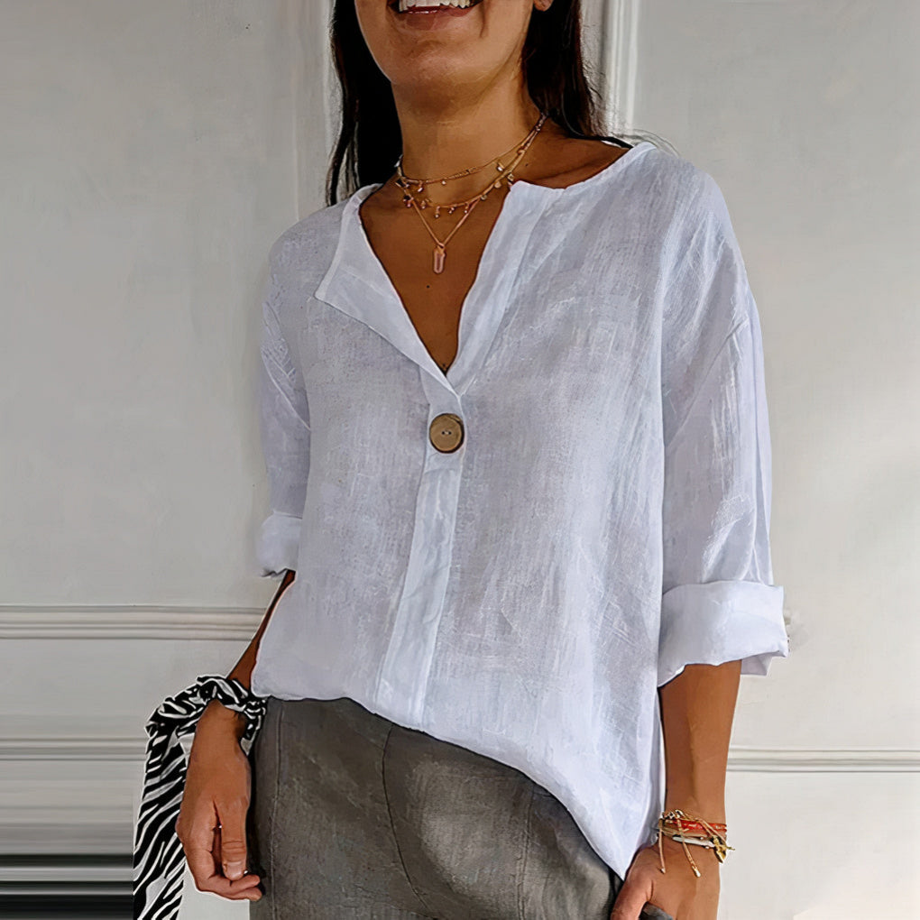 Women's lightweight linen blouse with a relaxed fit, perfect for casual summer days or beach outings.