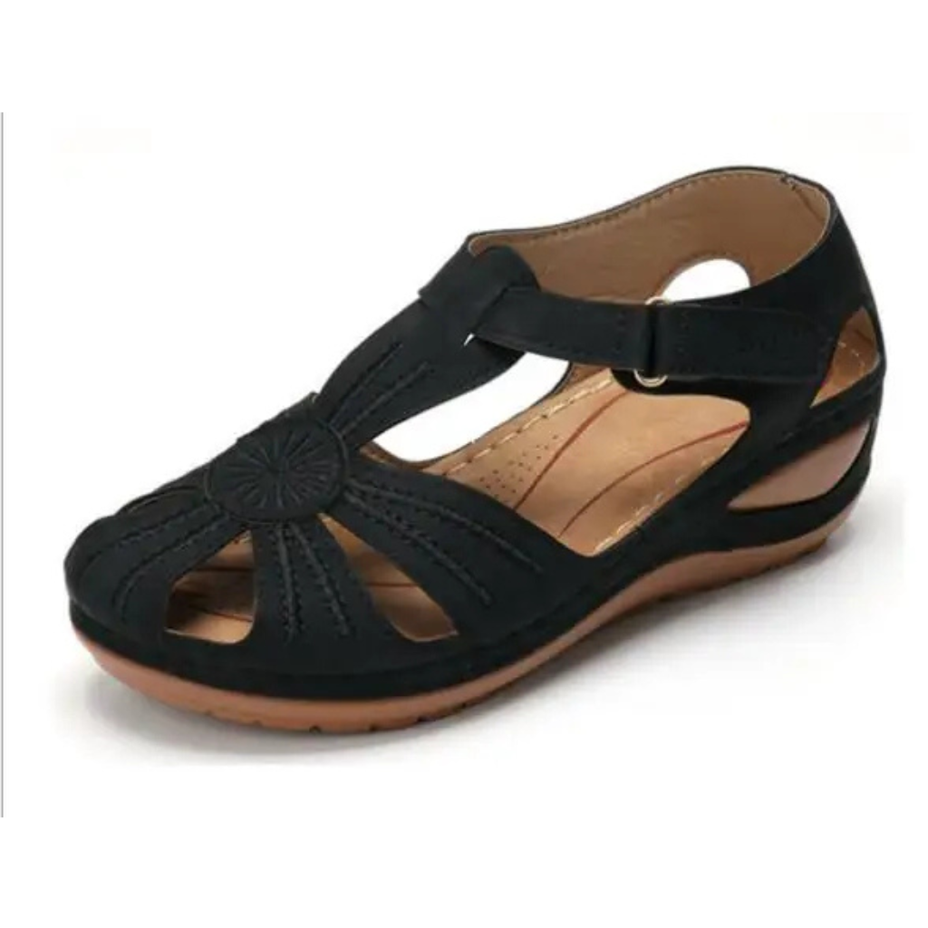 Women's comfortable orthopedic sandal with ergonomic design and adjustable straps, perfect for summer days.






