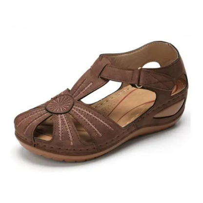 Women's comfortable orthopedic sandal with ergonomic design and adjustable straps, perfect for summer days.






