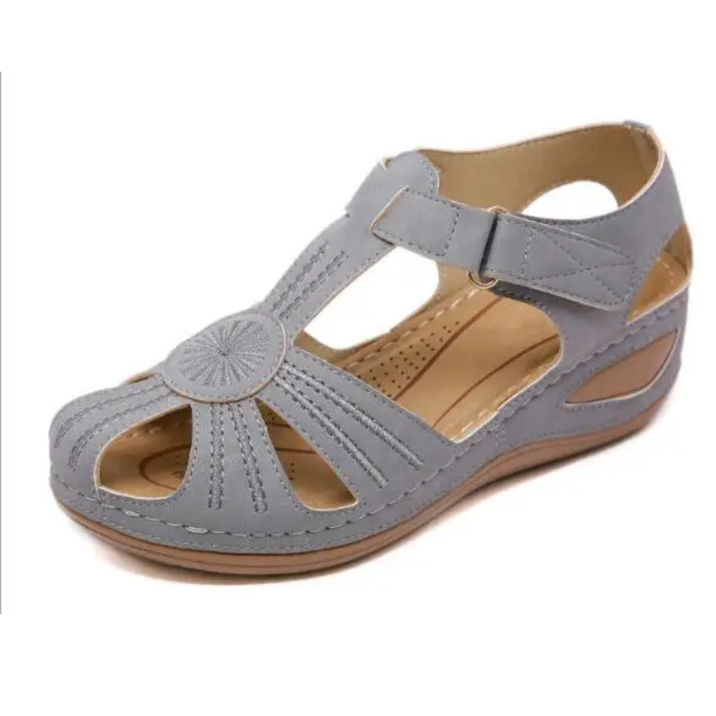 Women's comfortable orthopedic sandal with ergonomic design and adjustable straps, perfect for summer days.






